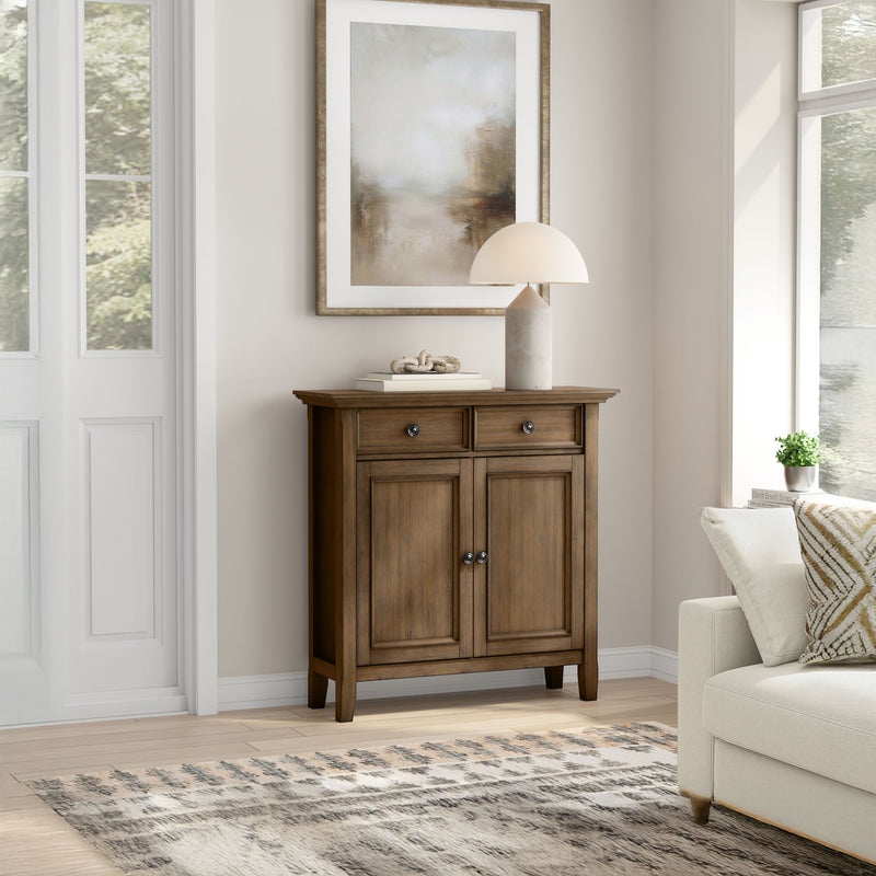 Simpli-Home Amherst storage cabinet with accent design, featuring wooden finish and multiple storage compartments.