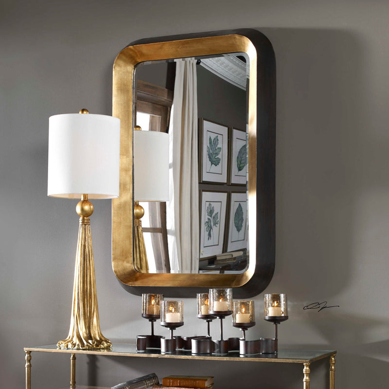 Uttermost Niva gold metallic wall mirror with round frame, decorative wall mirror for modern interior decor.