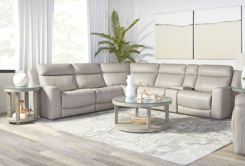 Parker Living Calgary reclining sectional sofa with plush cushions and fabric upholstery, shown in a modern living room setting.