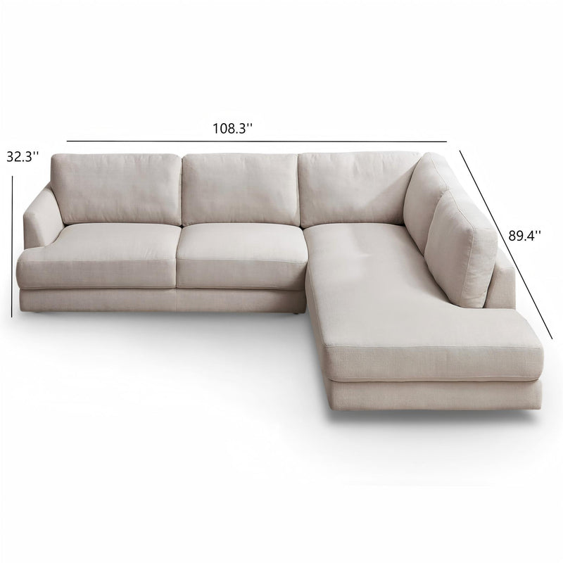 Ashcroft Furniture Glander cozy sectional sofa with plush cushions and neutral fabric, perfect for living room relaxation.