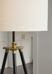 Cashner - Metal Floor Lamp - Black / Gold Finish - R&R Furniture Gallery (Fountain Valley, CA)