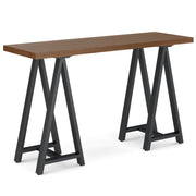 Handcrafted solid wood sawhorse coffee table by Simpli-Home with rustic design and sturdy construction.