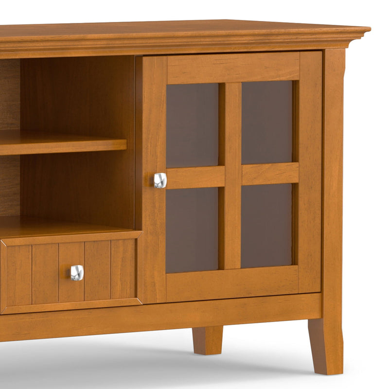 Simpli-Home Acadian TV media stand with open shelving and storage cabinets, made of wood with a natural finish, ideal for living rooms.