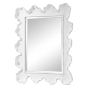 Uttermost Sea Coral wall mirror with a circular design resembling ocean coral, featuring a textured, natural finish.