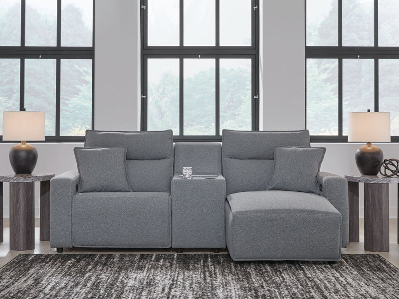 Signature Design by Ashley Modmax II reclining sectional in salt and pepper fabric with plush cushions and reclining features.