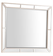 Elegant contemporary mirror by Glory Furniture featuring a sleek, modern design with a large reflective glass surface.