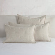 Classic Home Talia comforter set with coordinating pillow shams and decorative bedding in soft, neutral tones.