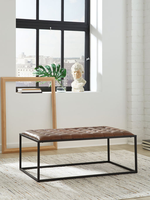 Junsor - Cocktail Ottoman - Brown / Black - R&R Furniture Gallery (Fountain Valley, CA)