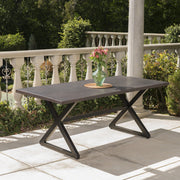 Noble House Rolando outdoor aluminum dining table with steel frame, rectangular tabletop and sleek modern design for outdoor dining.