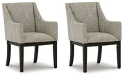 Set of two beige and dark brown Signature Design by Ashley dining UPH arm chairs with upholstered seats and wooden legs.