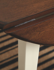 Woodanville - Round DRM Drop Leaf Table - Cream / Brown - R&R Furniture Gallery (Fountain Valley, CA)