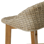 Set of two Noble House outdoor wicker and acacia wood barstools with water-resistant brown finish, ideal for patio or outdoor seating.