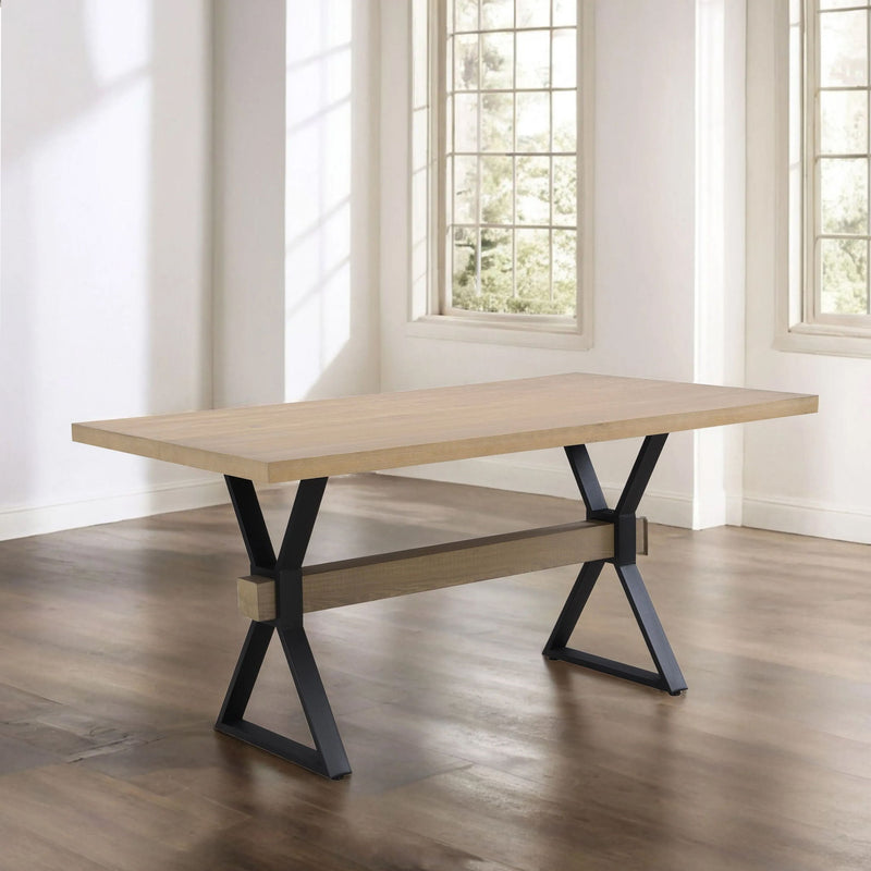 Noble House Elevated farmhouse dining table with light ash finish and X-shaped legs, showcasing a sturdy wooden surface.