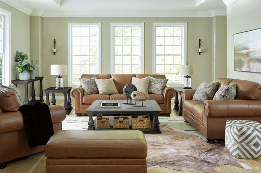 Signature Design by Ashley Carianna living room set with stationary chair and ottoman, stylish and comfortable for modern spaces.