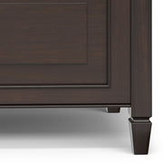 Simpli-Home Connaught storage bench with wooden top and fabric-lined interior for seating and extra storage space.