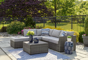 Petal Road - Loveseat Sectional, Ottoman, Table Set (Set of 4) - Gray - R&R Furniture Gallery (Fountain Valley, CA)