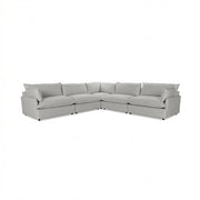 Classic Home Caplan modular sectional sofa with plush cushions and modern design, shown in a stylish living room setting.