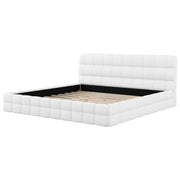 Dreamland upholstered platform bed with a padded headboard, showcasing a modern, cushioned design for bedroom comfort and style.