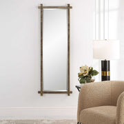 Uttermost Abanu ribbed dressing mirror with a sleek vanity mirror design and modern ribbed frame.