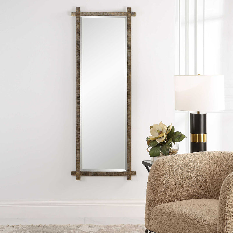 Uttermost Abanu ribbed dressing mirror with a sleek vanity mirror design and modern ribbed frame.