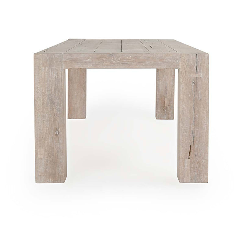 Classic Home Bristol dining table with a wooden surface and sturdy legs, ideal for modern dining rooms.