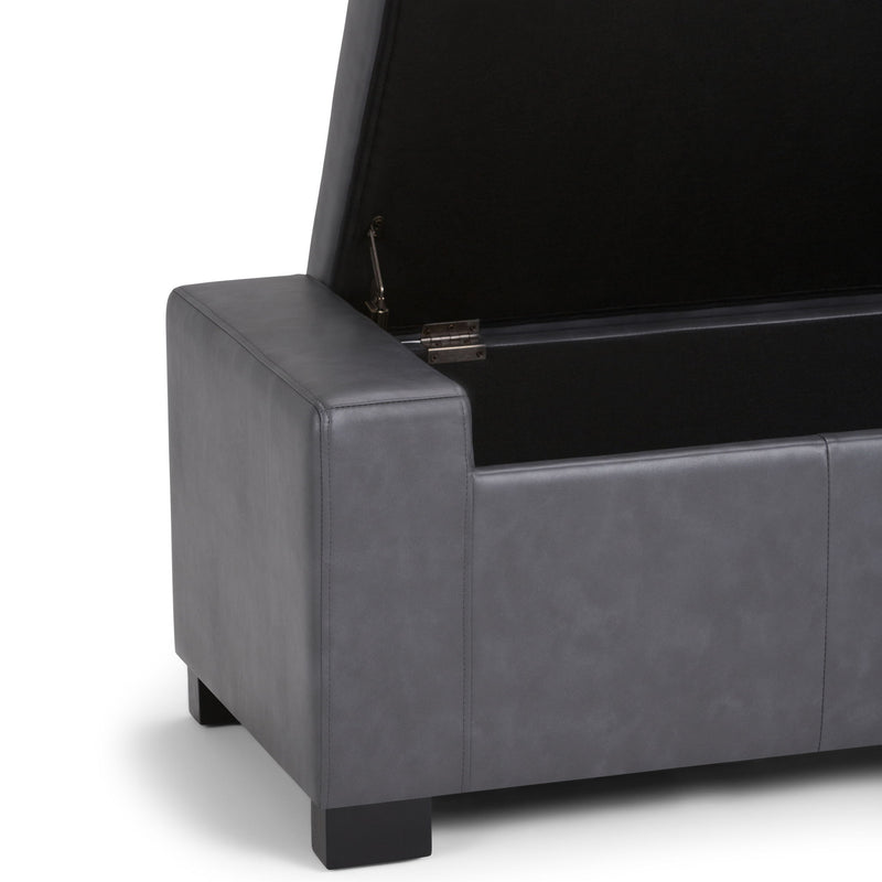 Large Simpli-Home Laredo storage ottoman with a contemporary design and fabric upholstery, serving as a versatile storage and seating piece.