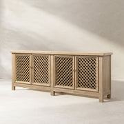 Jennifer Taylor Home Arden 4-door sideboard in natural wood finish, featuring clean lines and spacious storage compartments.