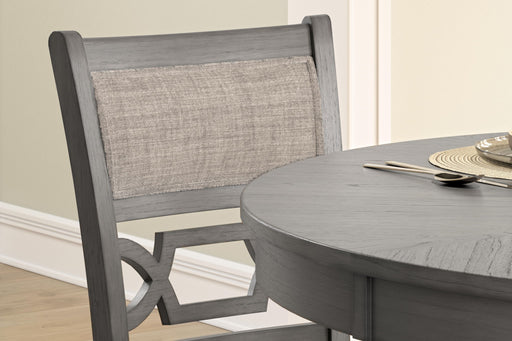 Set of five gray dining room tables from the Wrenning Drm Counter Table Set by Signature Design by Ashley, arranged together.