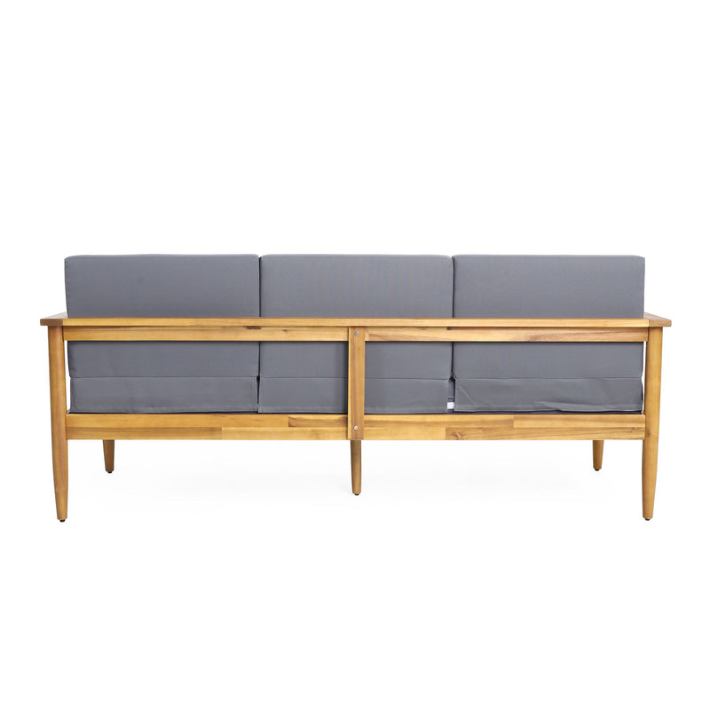 Dark gray outdoor 3-seater sofa with cushions and teak acacia wood frame by Noble House, perfect for patio seating.