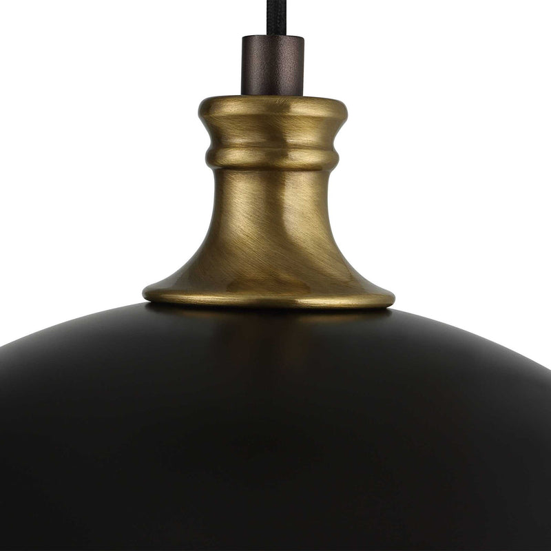 Uttermost Placuna bronze pendant light with a sleek, modern design featuring a single light fixture and stylish pendant illumination.