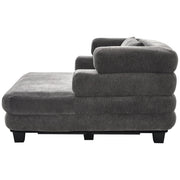 Noble House oversized chaise lounge sofa bed with deep seat and layered armrests, showcasing plush upholstery and modern design.