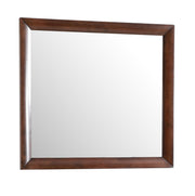 Glory Furniture Marilla mirror with sleek rectangular frame, hanging on a wall, reflecting a modern interior.