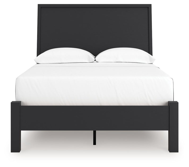 Signature Design by Ashley Danziar panel bed with low footboard, showcasing sturdy wooden frame and modern bedroom style.