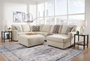 Signature Design by Ashley Edenfield 4-piece living room set with sofa, loveseat, and armchair in neutral upholstery.