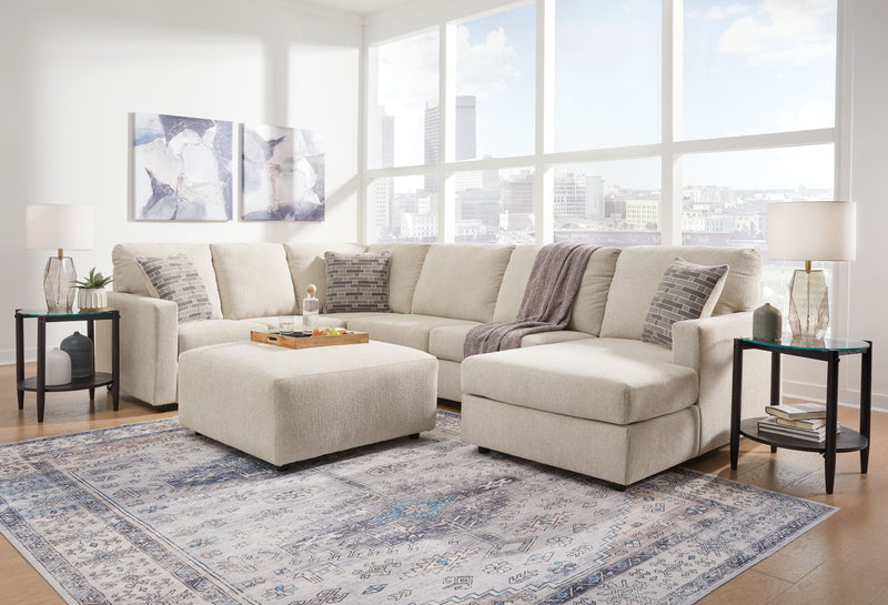 Signature Design by Ashley Edenfield 4-piece living room set with sofa, loveseat, and armchair in neutral upholstery.