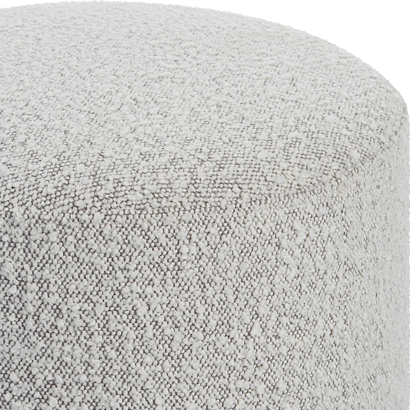 Uttermost Avila accent ottoman with plush fabric and wooden legs, showcasing a stylish, versatile piece for living spaces.