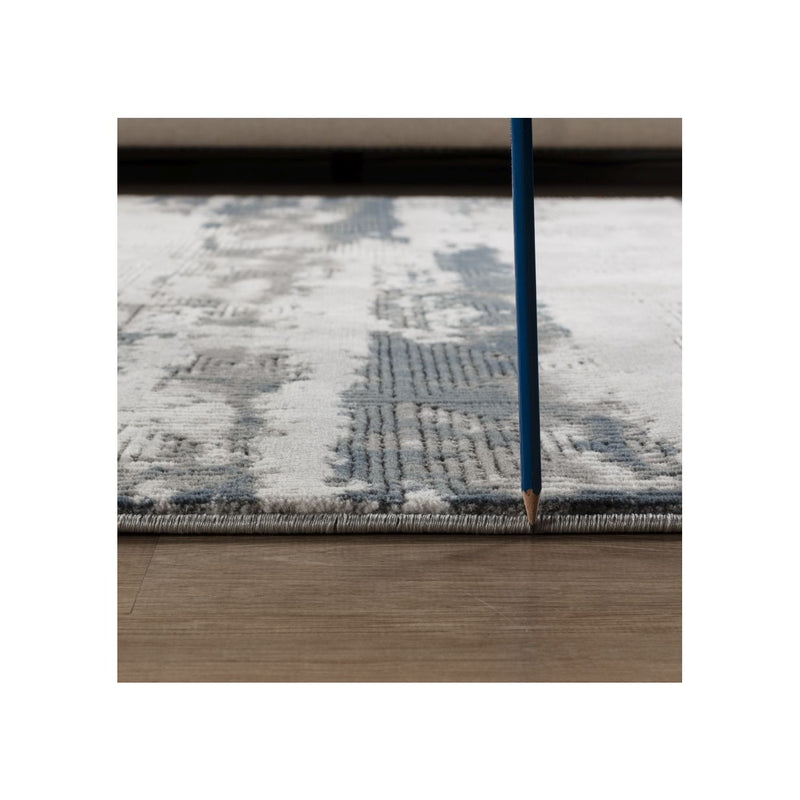Geometrix - 5'3" X 7'3" Area Rug With Geometric 3D Effect - Gray / Ivory - R&R Furniture Gallery (Fountain Valley, CA)