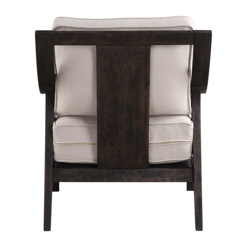 Beige Uttermost Lyle accent arm chair with plush upholstery and wooden legs, stylish and comfortable for living room decor.