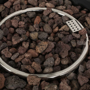 Round Noble House iron fire pit with 40,000 Btu burner, featuring a sturdy metal design and a spacious fire bowl for outdoor heating.