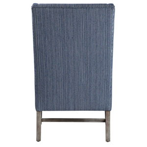Blue Galiot Wingback Accent Chair by Uttermost with tufted upholstery and wooden legs, stylish and comfortable for living spaces.