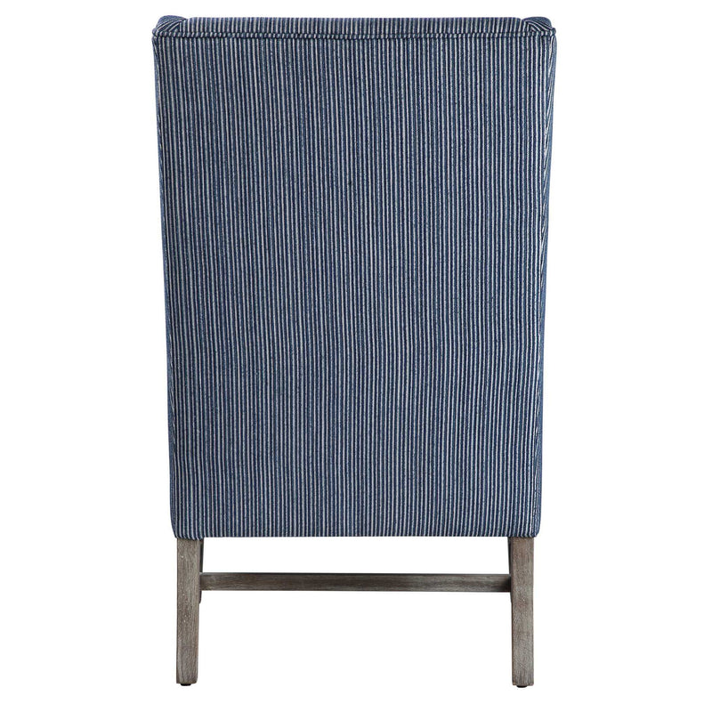 Blue Galiot Wingback Accent Chair by Uttermost with tufted upholstery and wooden legs, stylish and comfortable for living spaces.