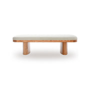Upholstered Ollie Bench by TOV Furniture featuring a sleek design with soft fabric and wooden legs in a modern living space setting.