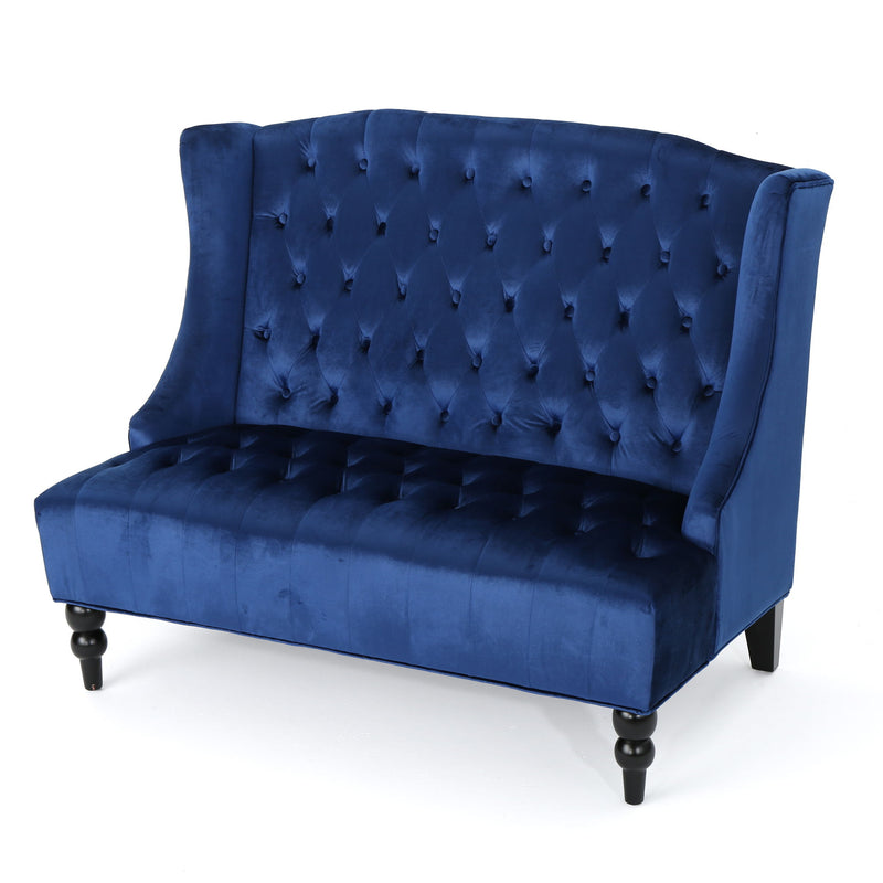 Noble House upholstered loveseat with wing back design and diamond tufting, featuring plush fabric and elegant style.