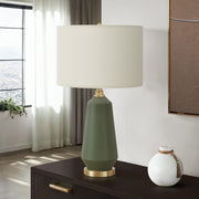 Contemporary green ceramic table lamp by 8th Street with a sleek design and smooth finish, suitable for modern home decor.