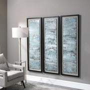 Set of three blue painted metal wall decor pieces by Uttermost featuring ocean swell designs for coastal-inspired home decor.