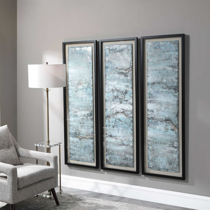 Set of three blue painted metal wall decor pieces by Uttermost featuring ocean swell designs for coastal-inspired home decor.