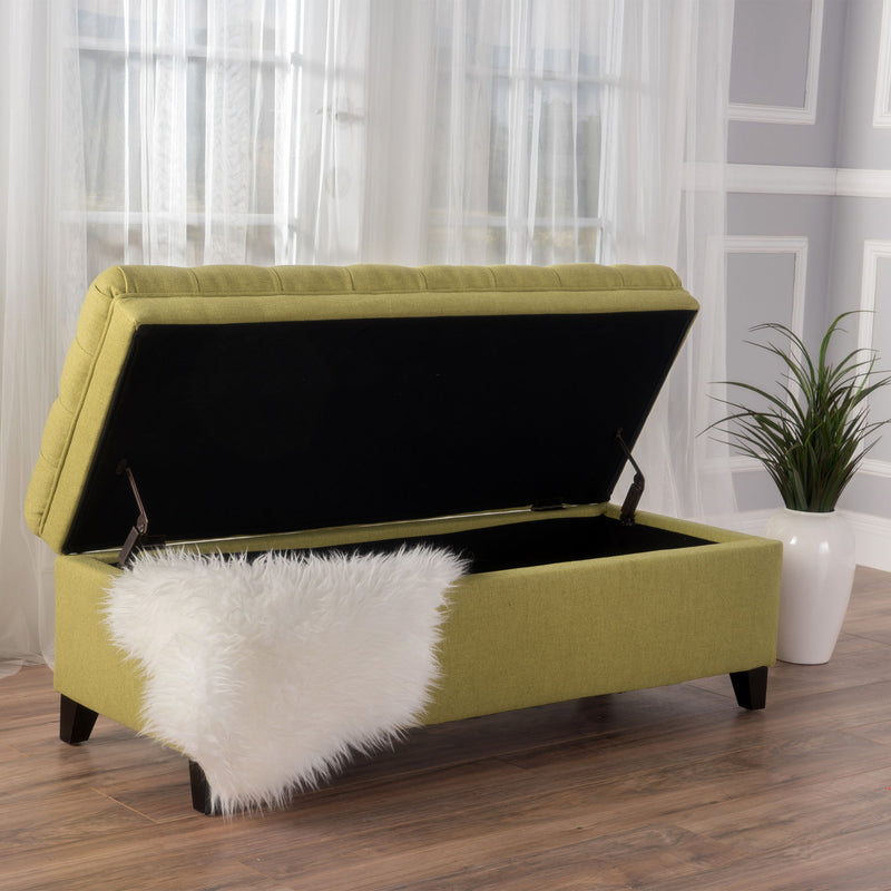 Noble House Juliana storage ottoman with birch wood legs, upholstered in neutral fabric, showing a plush, versatile furniture piece.