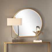 Uttermost Cabell wall mirror with a sleek, modern frame, hanging on a wall, showcasing stylish home decor.