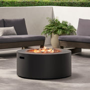 Round Noble House iron fire pit with 40,000 Btu burner, suitable for outdoor heating and cozy gatherings.