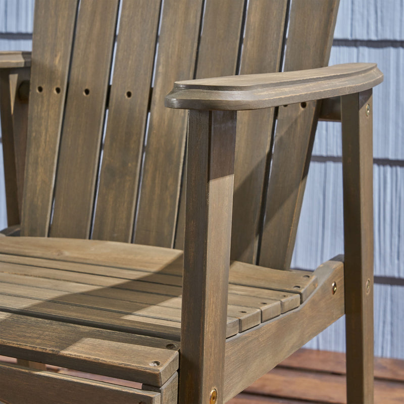 Pair of Noble House outdoor weather-resistant acacia wood Adirondack dining chairs set, featuring wide armrests and slatted backrests.